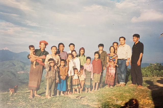 Manh visits family in Laos for the first time since leaving the country.